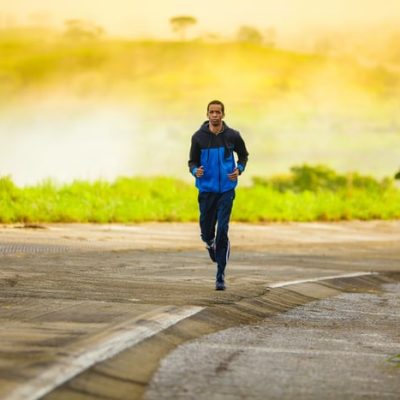 Man Running in Tracksuit