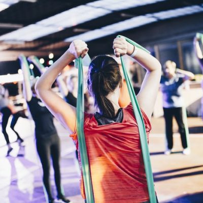 Women Working Out with Instructor